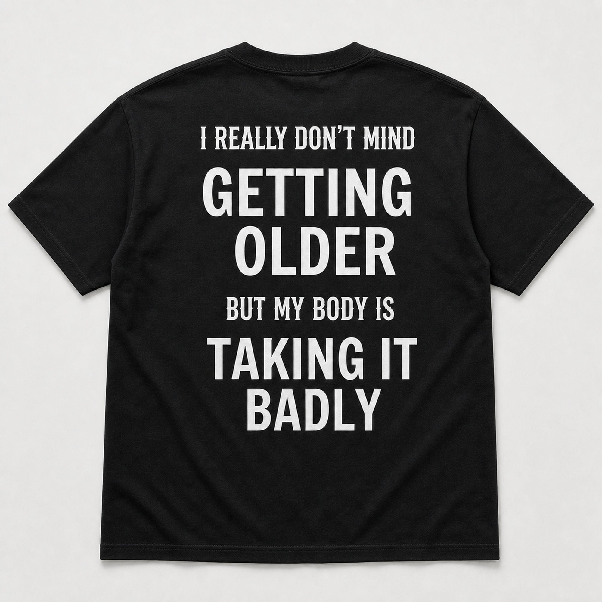 Getting Older Taking It Badly funny graphic tee black back print flat lay