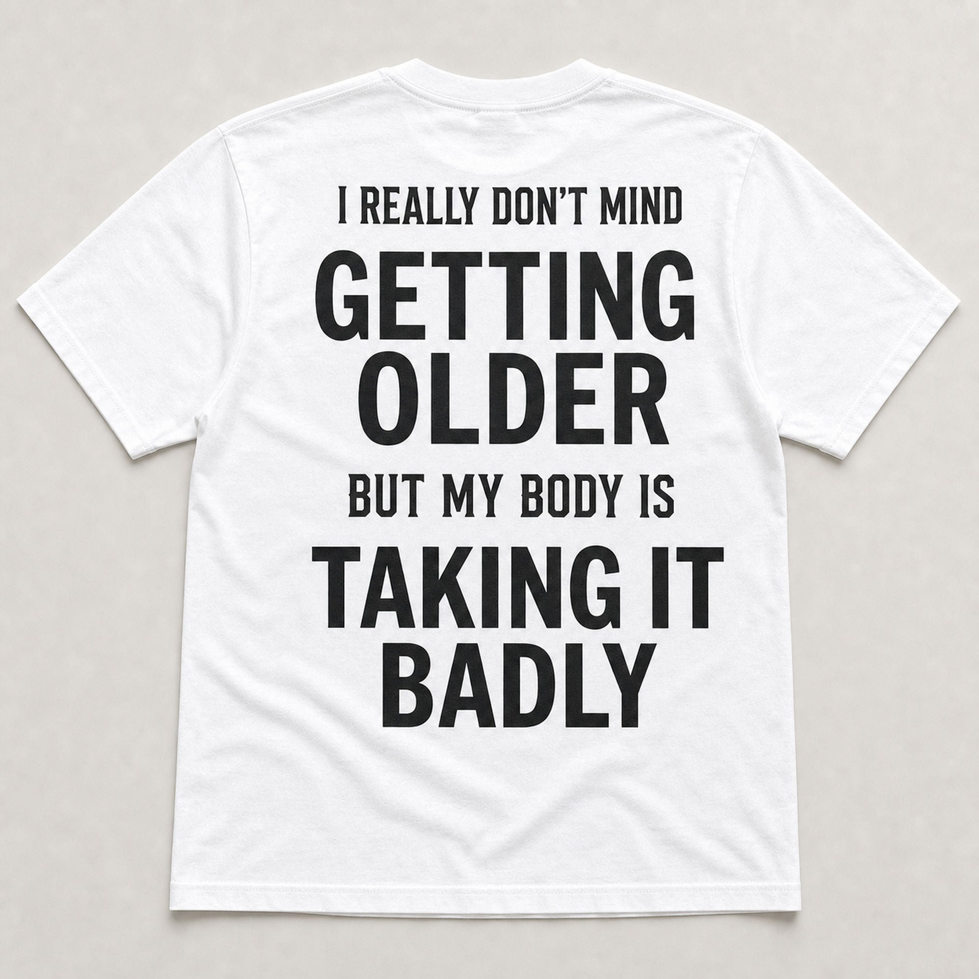 Getting Older Taking It Badly funny graphic tee white back print flat lay