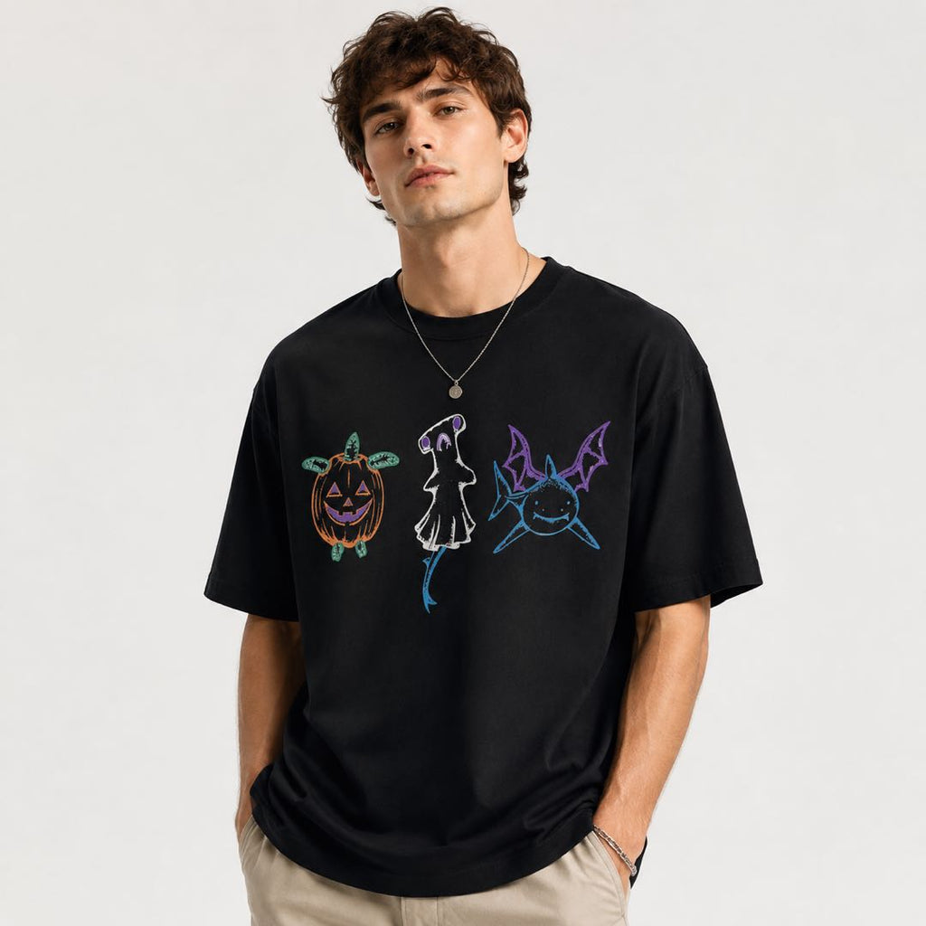 Cute Halloween Trio Graphic T-Shirt | Pumpkin Ghost Bat Shirt | Spooky Season Unisex Tee