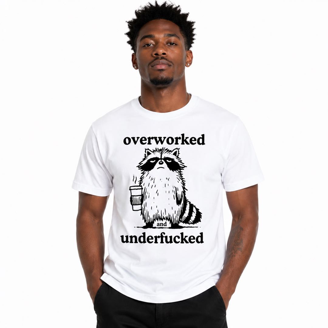Overworked & Underf*cked Raccoon Funny T-Shirt | Burnt Out Coffee Lover Graphic Tee
