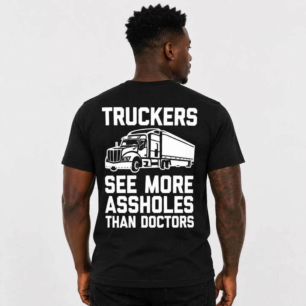 Truckers See More Assholes Than Doctors Funny T-Shirt | Trucker Humor Graphic Tee | Funny Gift for Truck Drivers